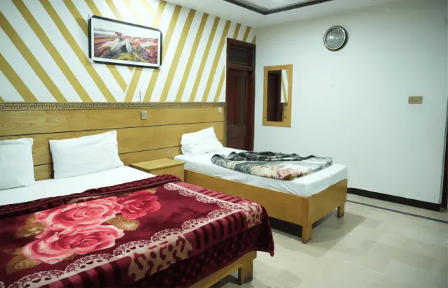 One Room, Two Bed Styles
