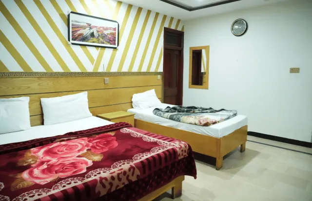One Room, Two Bed Styles